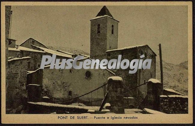 Puente e iglesia nevados en pont de suert (lleida)