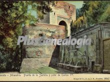 Puerta de la justicia y pliar de carlos v en la alhambra de granada